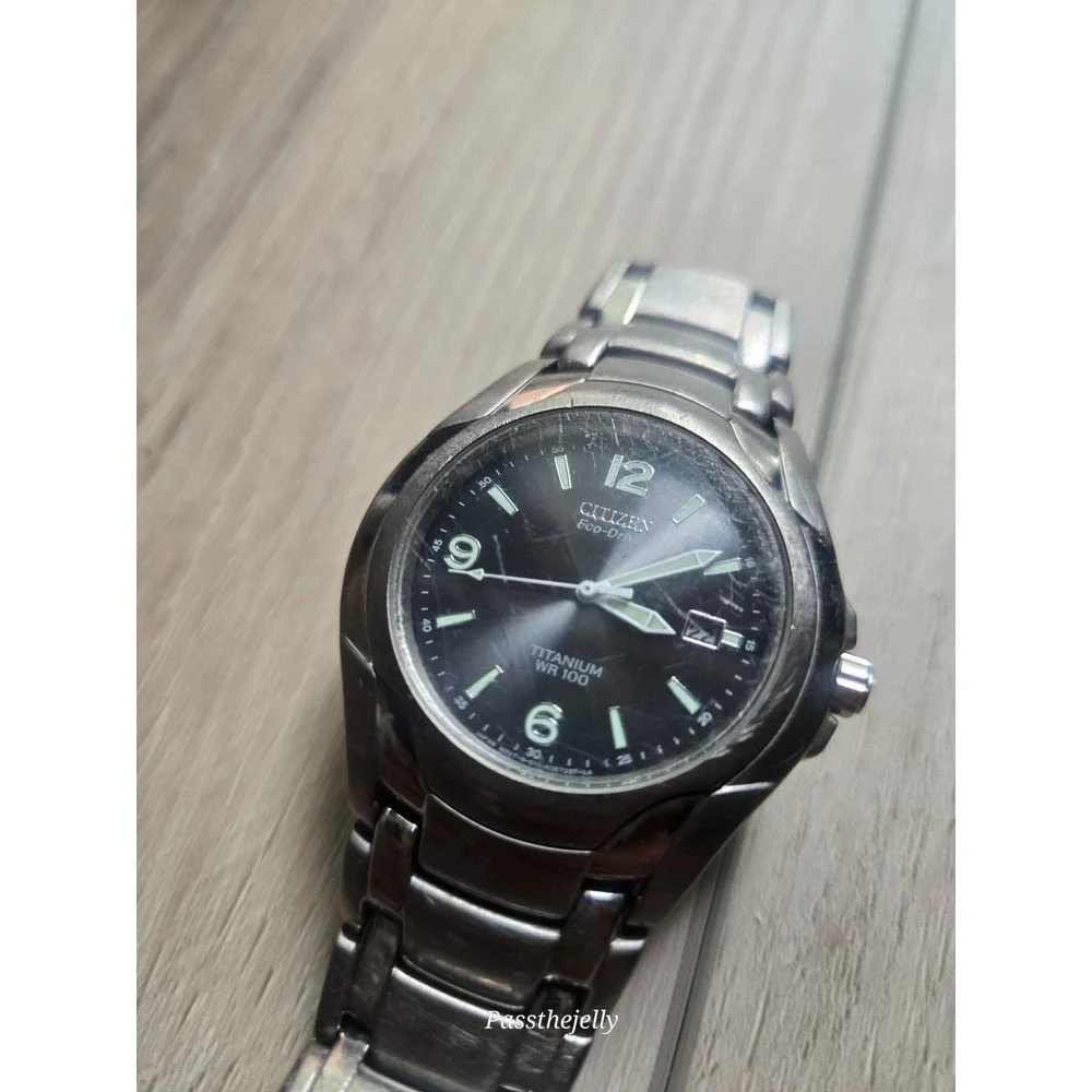 Citizen Watch Mens Eco-Drive Titanium WR100 Black Dial Date Bracelet Field Watch